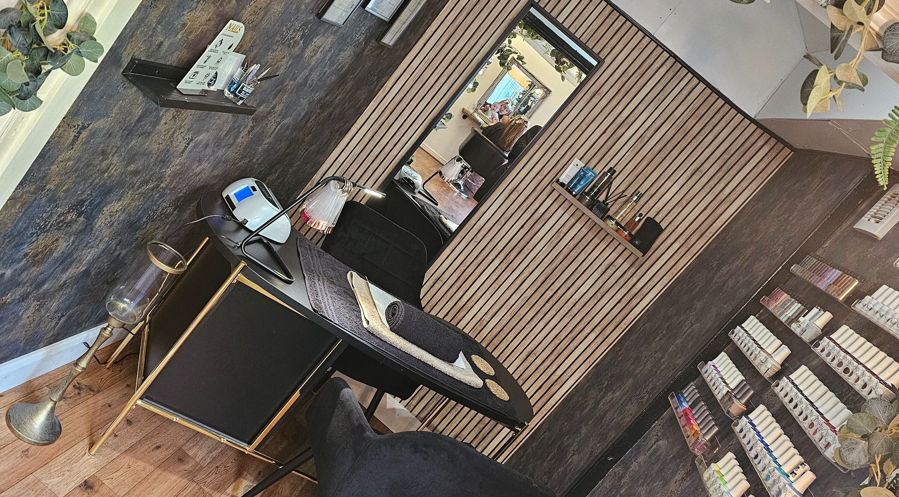 Elegant nail station at All Things Beauty, Wakefield, England, GB, featuring a modern design with tools and decor.