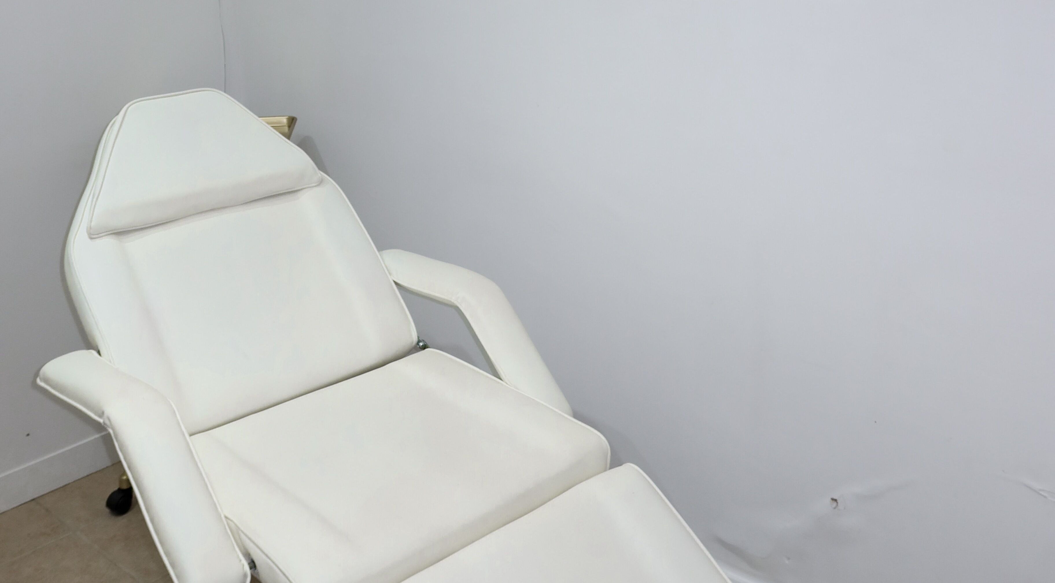 Luxurious treatment chair at Glow By Eve - Skin in Bedworth, England, GB, offering relaxation and comfort.