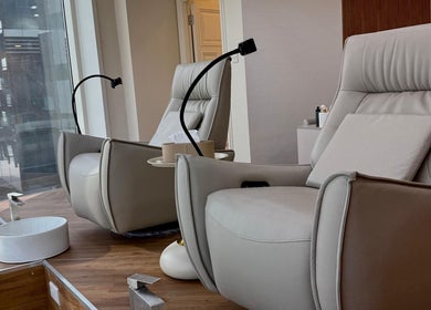 Luxurious lounge chairs at 13: Thirteen Beauty Lounge in Dubai, Dubai, AE, offering comfort and relaxation.