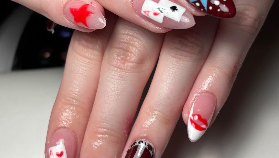 Colorful artistic nail design at Kira’s Nail Studio, Salford, England, GB showcasing creative nail art.