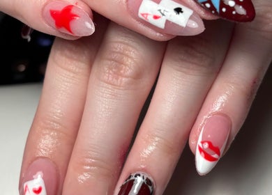 Colorful artistic nail design at Kira’s Nail Studio, Salford, England, GB showcasing creative nail art.