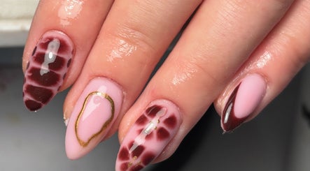 Stylish nail art with intricate patterns at Kira’s Nail Studio, Salford, England, GB.