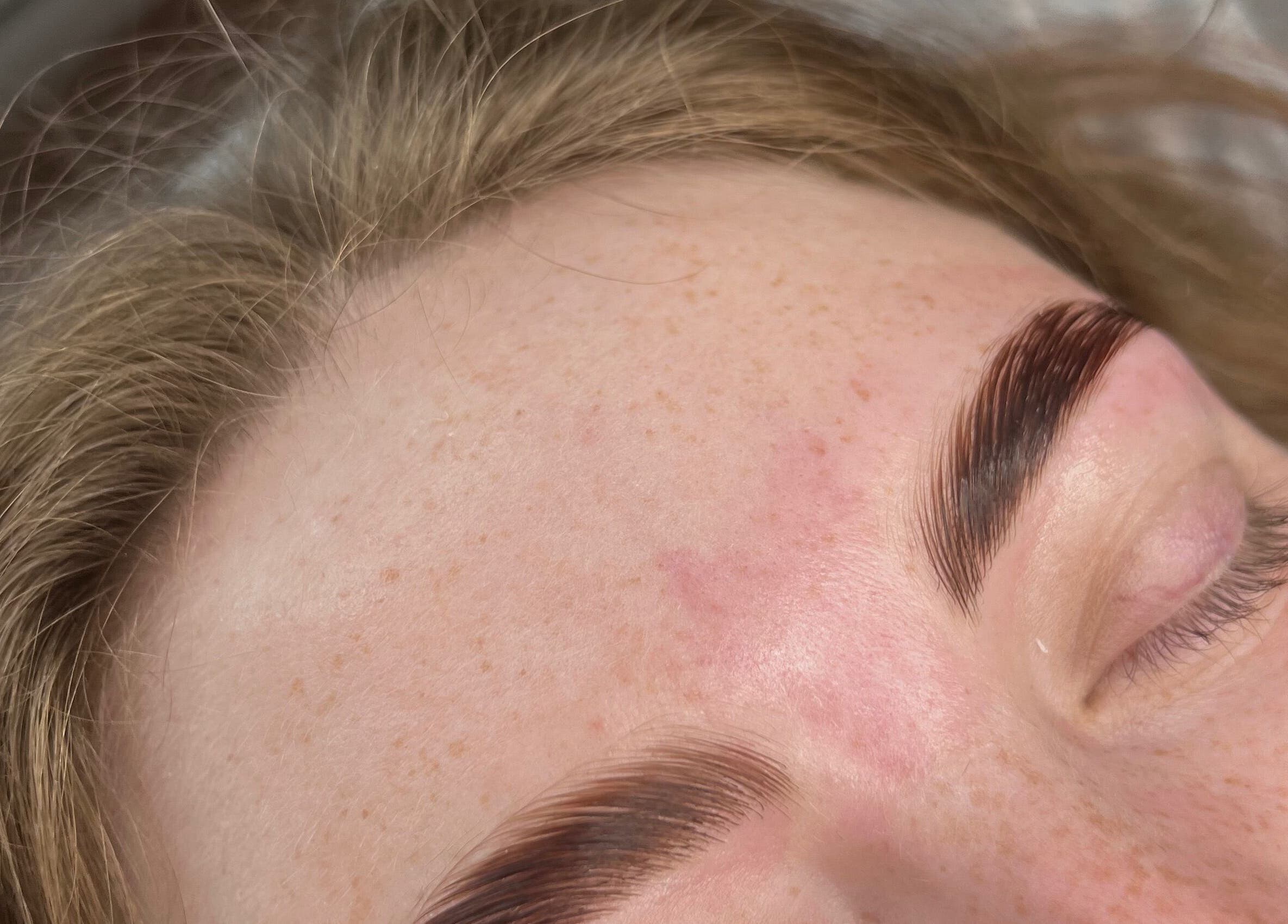 Close-up of styled eyebrows at Sophie's beauty bar in Midhurst, England, GB showcasing professional care.
