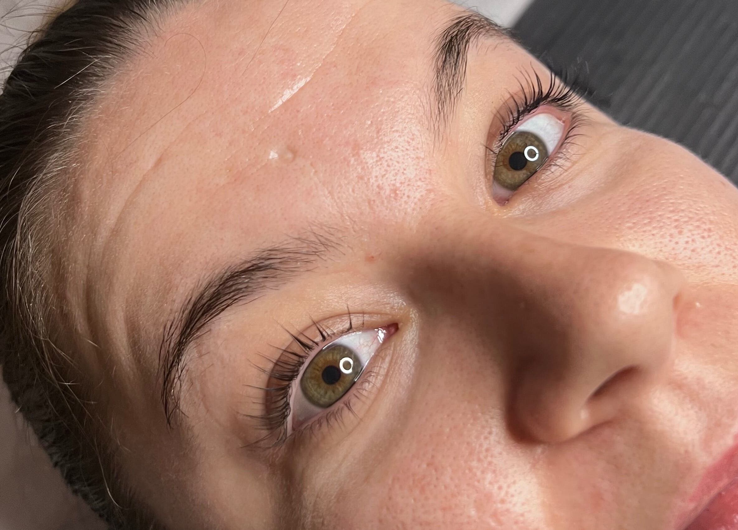 Close-up of a rejuvenated face post-treatment at Sophie's Beauty Bar, Midhurst, England, GB.