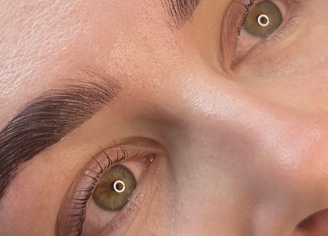 Detailed close-up of expertly shaped eyebrows at Sophie's Beauty Bar, Midhurst, England, GB.