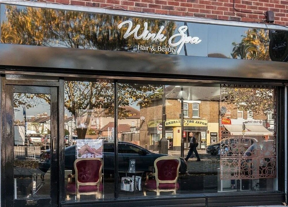 Front view of Wink Spa in Feltham, England, GB, featuring elegant exterior design.