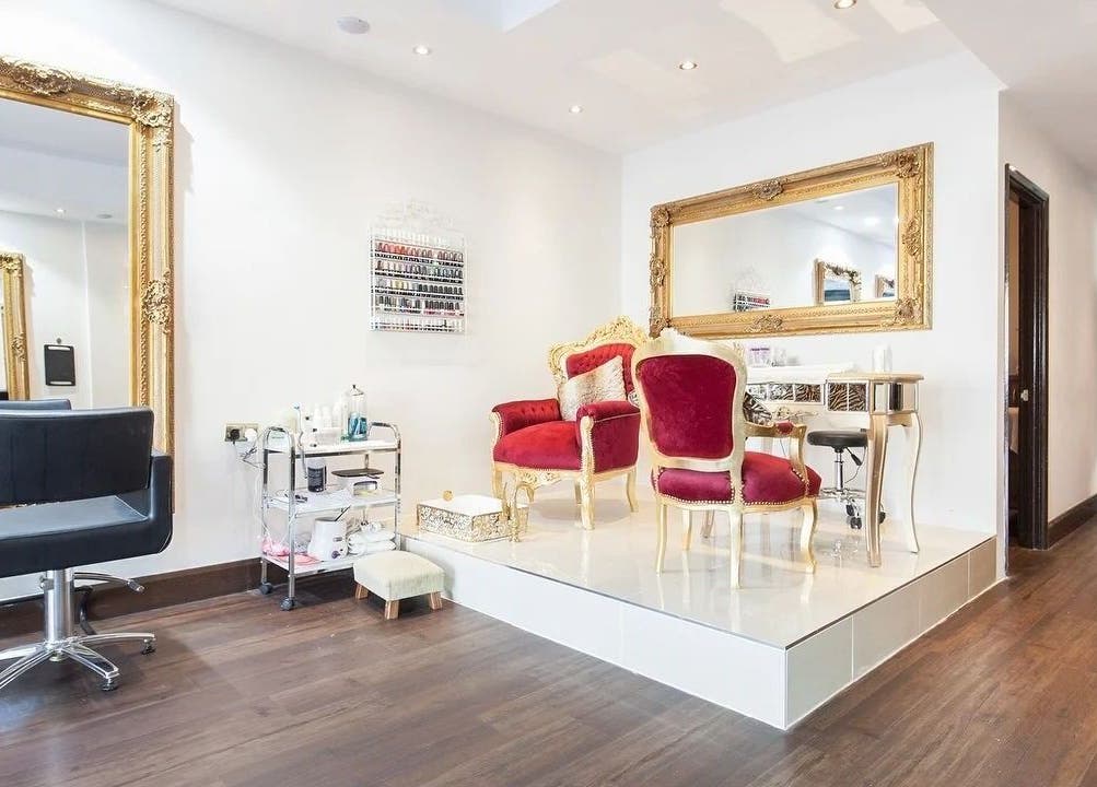 Luxurious vintage decor at Wink Spa, Feltham, England, GB highlighting plush seating and ornate mirrors.