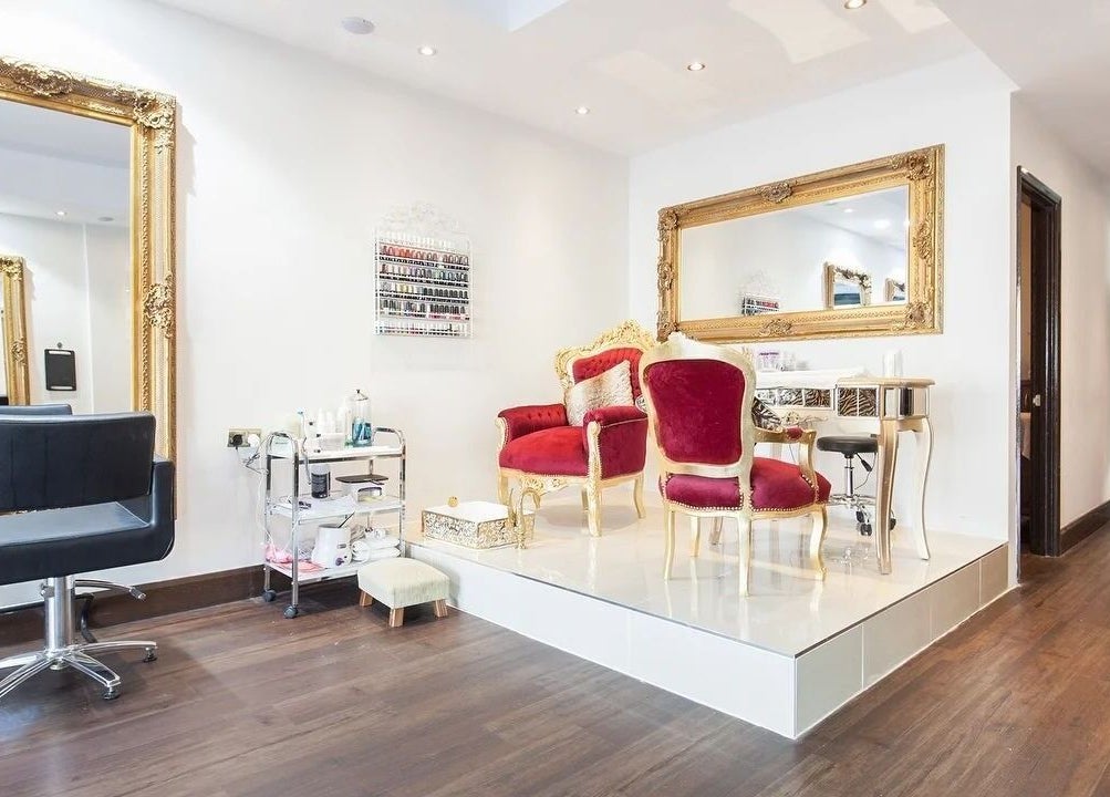 Luxurious vintage decor at Wink Spa, Feltham, England, GB highlighting plush seating and ornate mirrors.