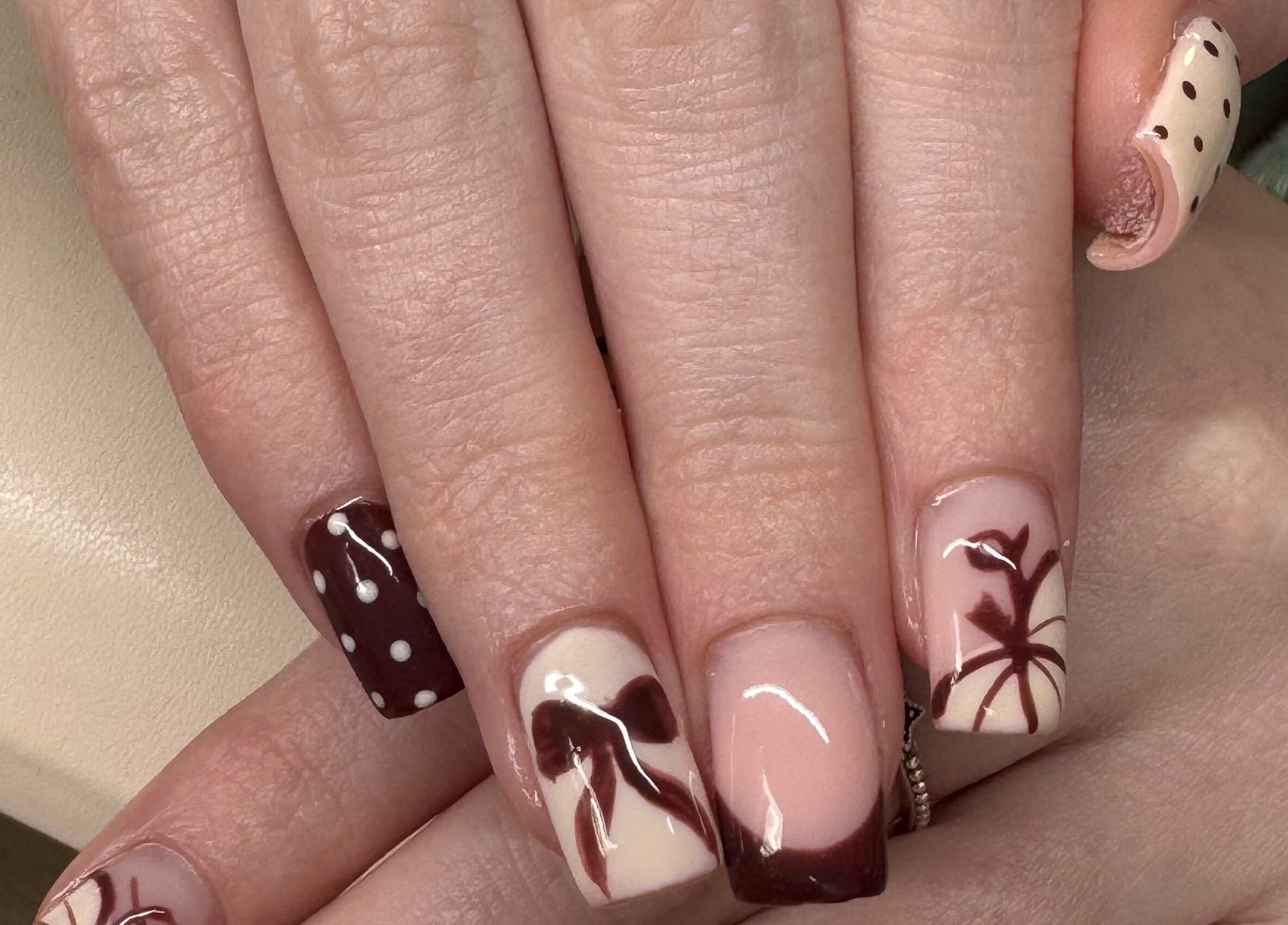 Stylish nail design by Nicole Mc Arthur Nail Tech in Ayr, Scotland, GB showcasing intricate patterns.