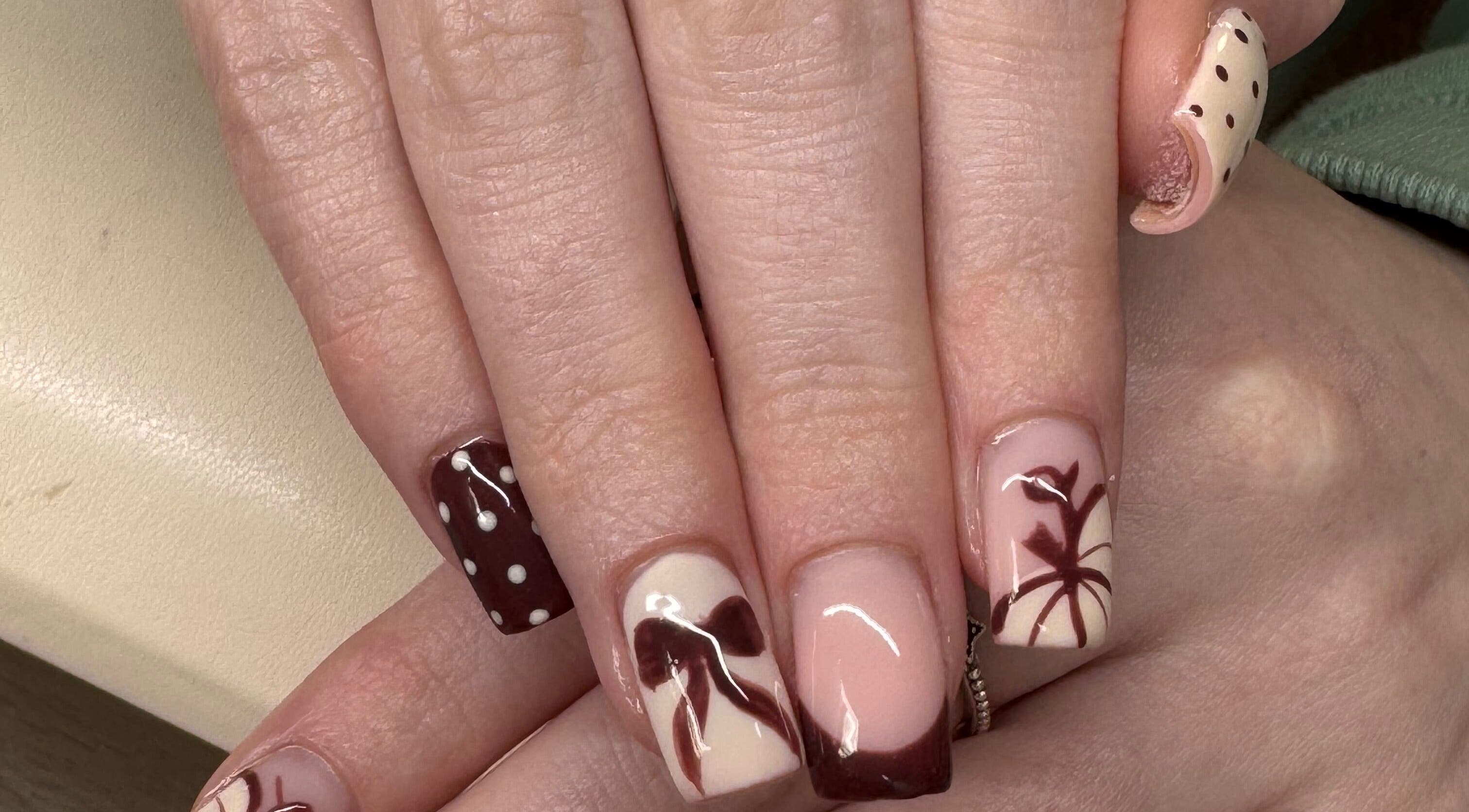 Stylish nail design by Nicole Mc Arthur Nail Tech in Ayr, Scotland, GB showcasing intricate patterns.