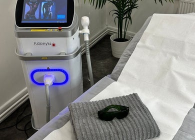 Treatment setup at Olga Genc Beauty in Chichester, England, GB with laser equipment and safety glasses.