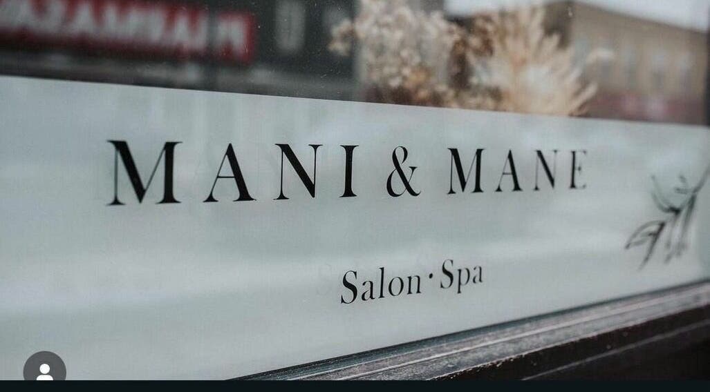 Mani & Mane salon spa sign at Lucknow, Ontario, CA showcasing elegance and style.