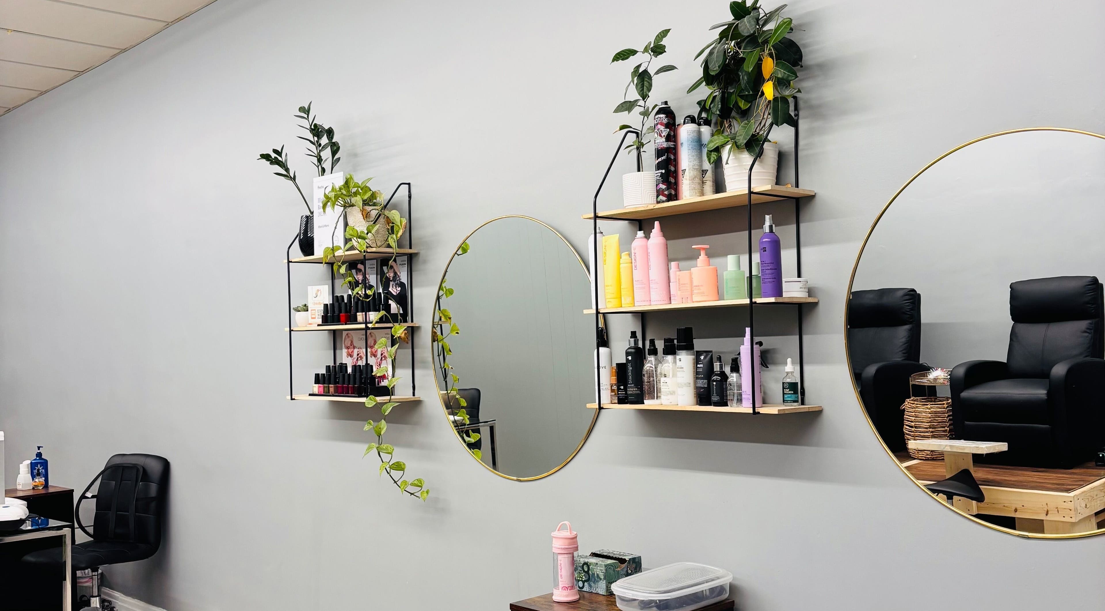 Elegant shelves and mirrors adorn Mani & Mane in Lucknow, Ontario, CA, exuding a tranquil spa ambiance.
