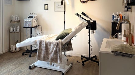 Calming treatment room at Bellissimos Beauty Bar in Greater Sudbury, Ontario, CA with spa bed and skincare tools.