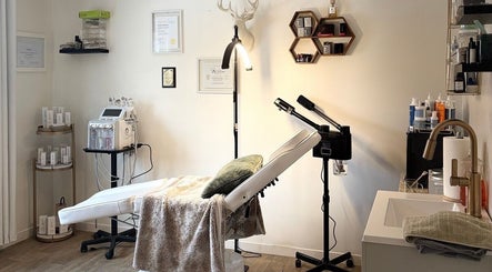 Cozy therapy room at Bellissimos Beauty Bar, Greater Sudbury, Ontario, CA, featuring modern skincare equipment.