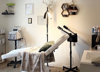 A serene treatment room at Bellissimos Beauty Bar, Greater Sudbury, Ontario, CA, featuring a plush recliner.