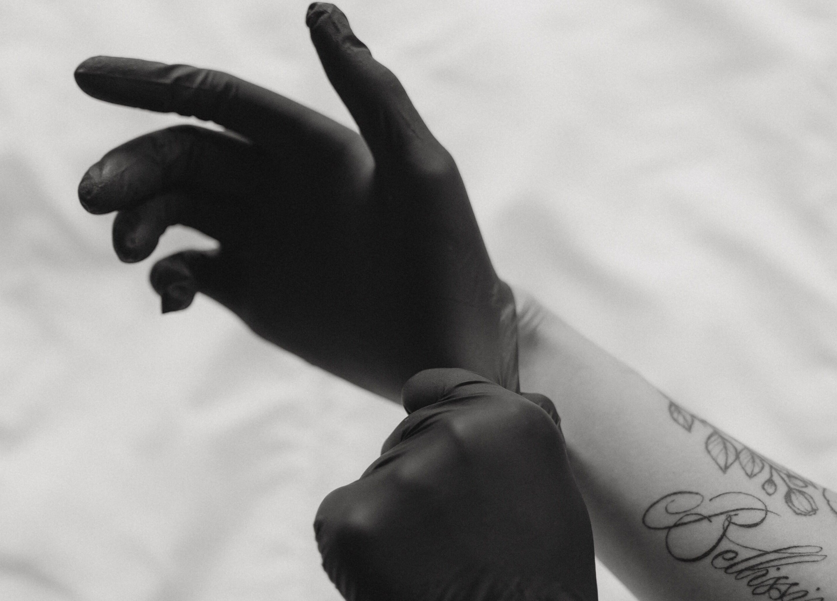 Professional preparing with gloves at Bellissimos Beauty Bar, Greater Sudbury, Ontario, CA.