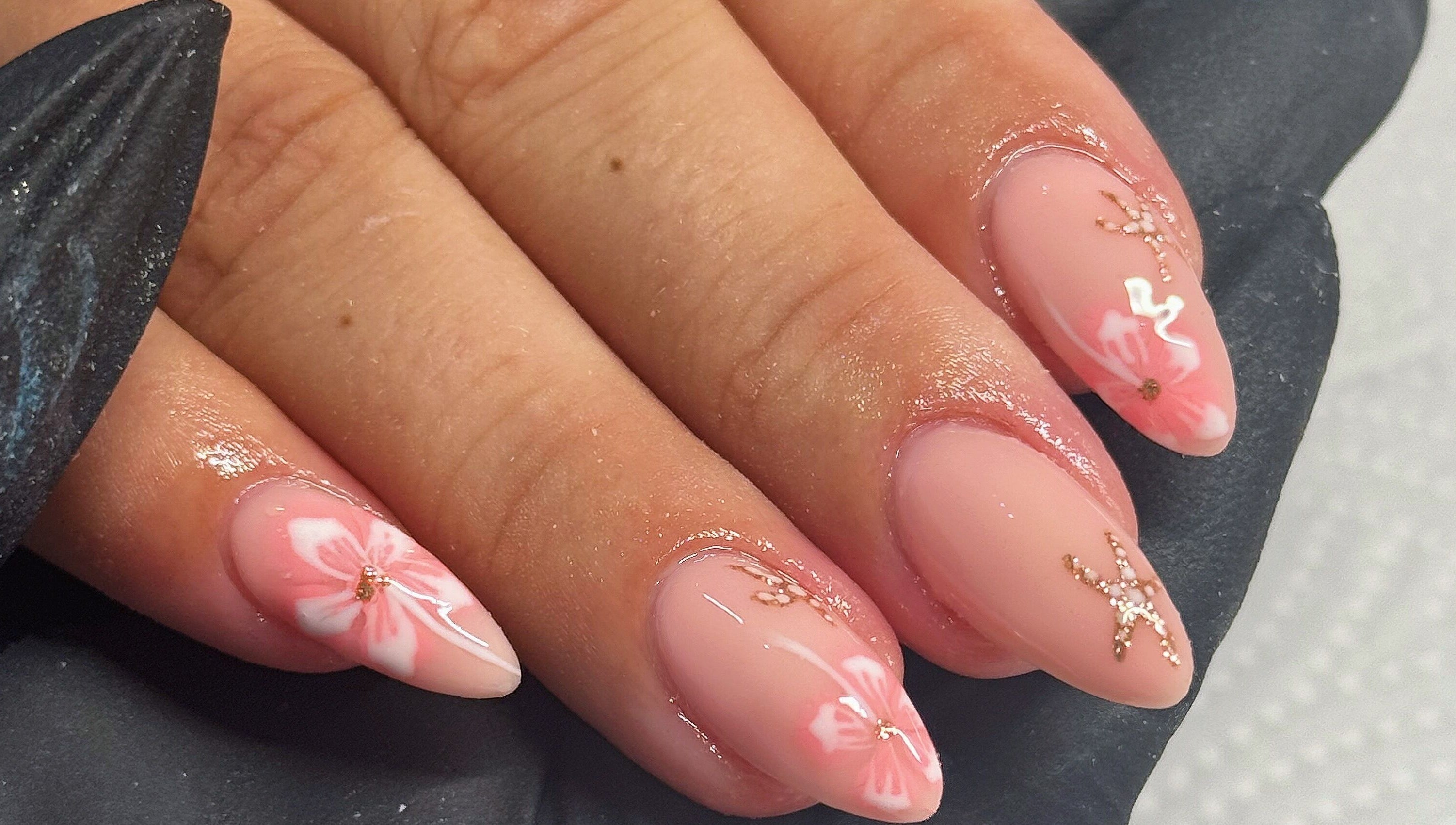 Pink floral nail art design at Touch Of Beauty, Blyth, England, GB.
