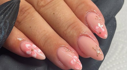 Pink floral nail art design at Touch Of Beauty, Blyth, England, GB.
