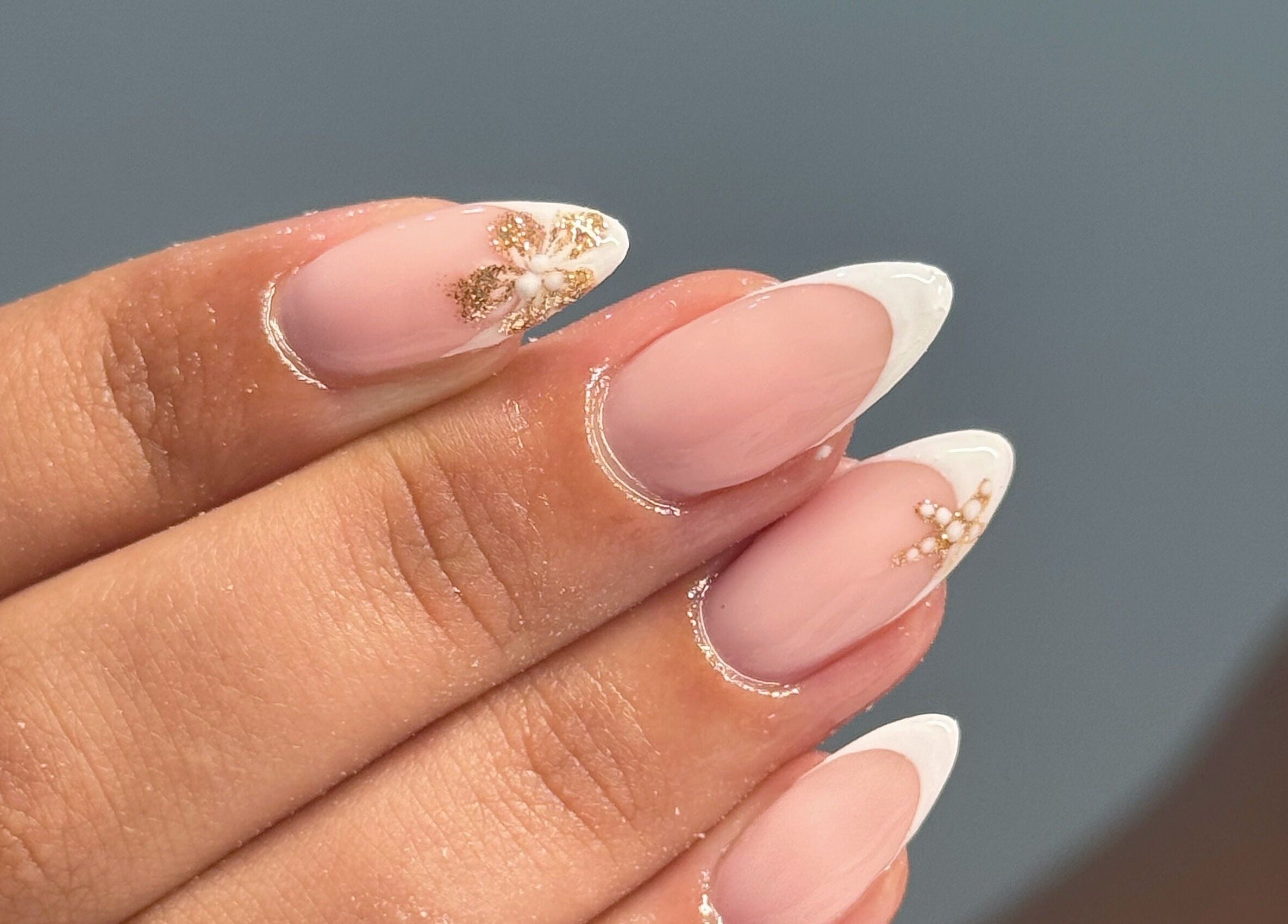 Elegant nail art with floral accents at Touch Of Beauty, Blyth, England, GB.