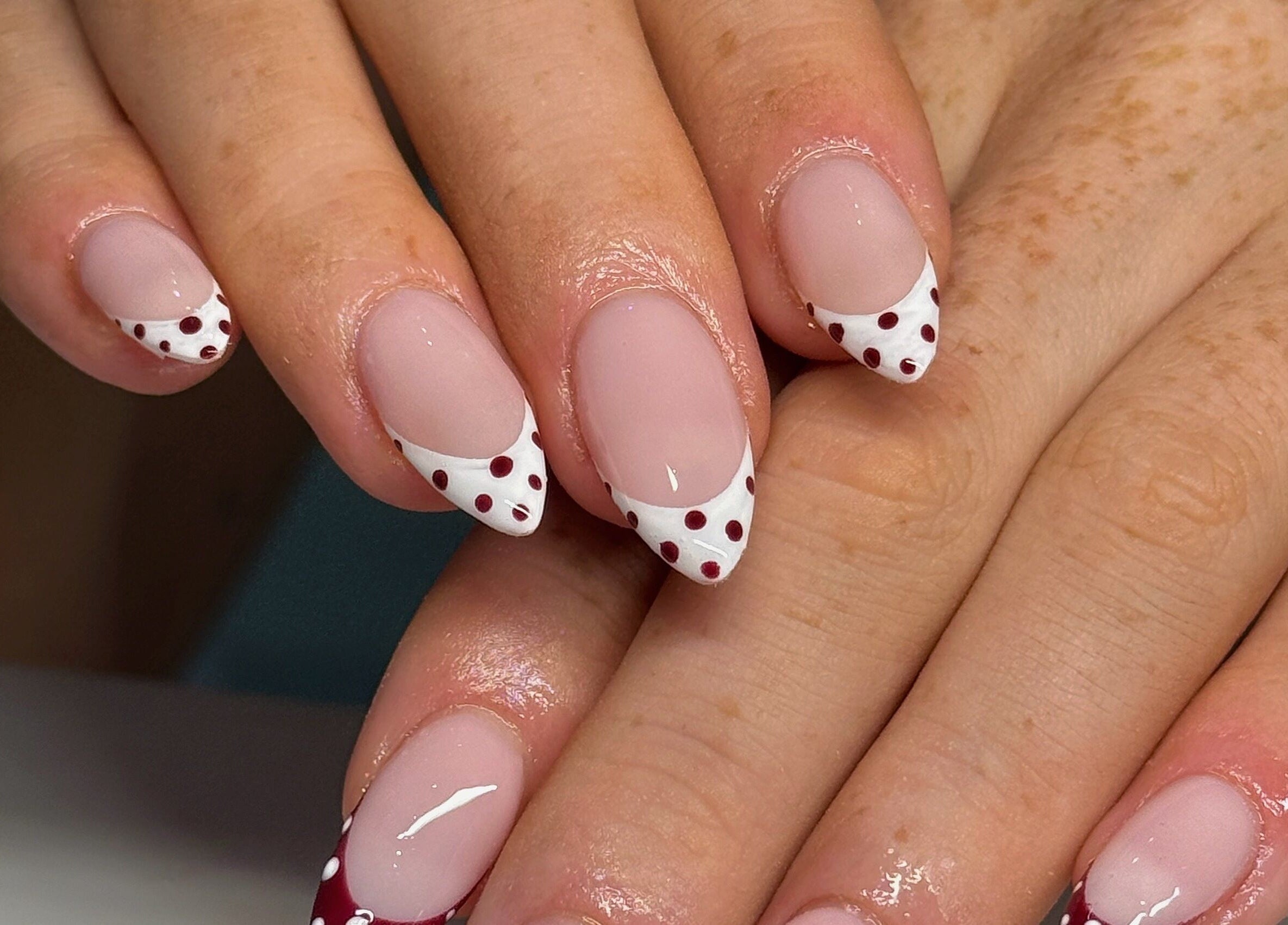 Stylish polka dot nail design at Touch Of Beauty, Blyth, England, GB offers chic nail art services.