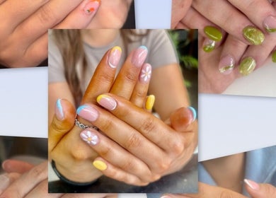 Colorful nail art with floral designs at Beauty Bound by Alex, Flint, Wales, GB. Bright and vibrant manicure display.