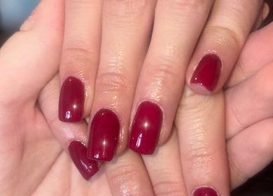 Beautifully manicured red nails at Beauty Bound by Alex, Flint, Wales, GB. Experience elegance and style.