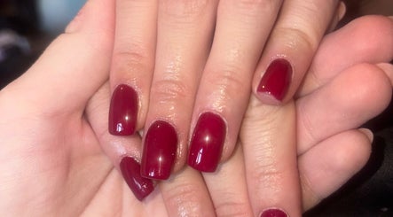 Beautifully manicured red nails at Beauty Bound by Alex, Flint, Wales, GB. Experience elegance and style.