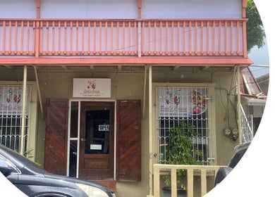 Entrance of Pure Bliss Spa in Roseau, Saint George Parish, DM, showcasing its inviting facade.
