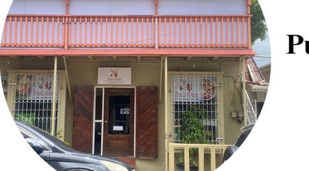 Entrance of Pure Bliss Spa in Roseau, Saint George Parish, DM, showcasing its inviting facade.