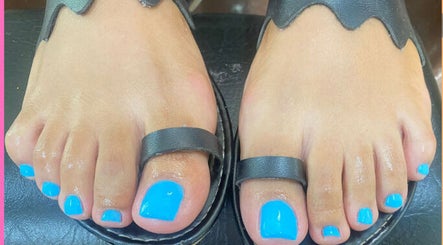 Bright blue pedicure at Pure Bliss Spa, Roseau, Saint George Parish, DM. Perfectly polished toenails.