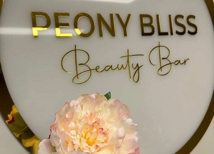Elegant Peony Bliss Beauty Bar sign in Dieppe, New Brunswick, CA, featuring a peony accent.