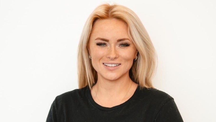 Smiling professional at Lash Artistry by Steph in Liphook, England, GB, offering top beauty services.