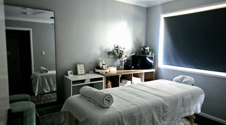 Tranquil massage room at Tays Massage in Griffin, Queensland, AU, featuring a comfortable massage table.