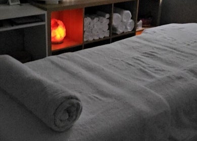 Cozy massage table with soft lighting at Tays Massage, Griffin, Queensland, AU.
