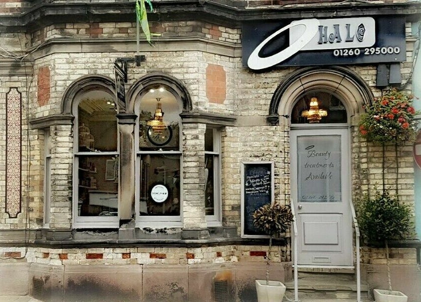 Charming exterior of Halo beauty venue in Congleton, England, GB with elegant arch windows and signage.