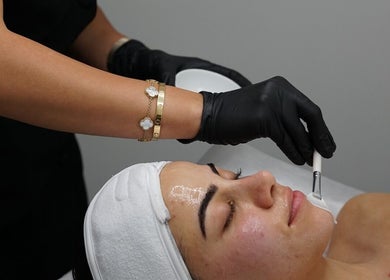 Glow facial treatment at Beauface Skin, Silverwater, New South Wales, AU. Skincare specialist applying mask.