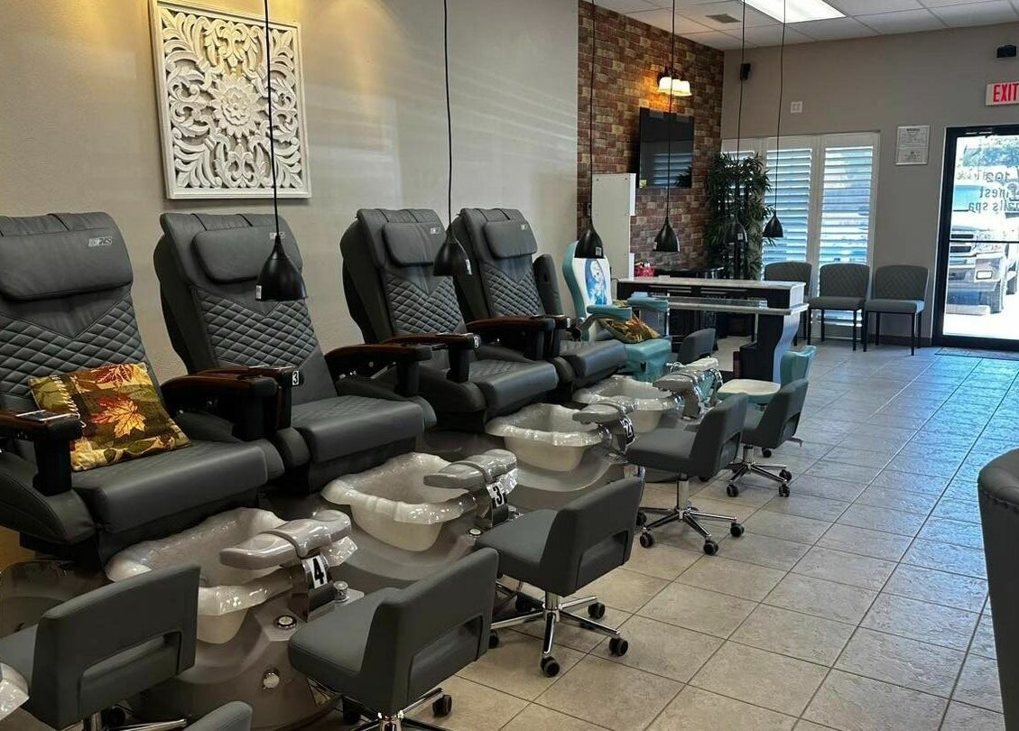 Luxurious pedicure chairs at Pfinesse Salon & Spa in Pflugerville, Texas, US offering relaxing beauty treatments.