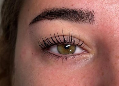 Close-up of a well-groomed eye with long lashes at BY ALH, Essex, England, GB.