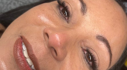 Close-up of a smiling woman showcasing perfect eyelashes at The Beauty Spot_Cpt, Cape Town, Western Cape, ZA.