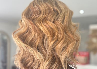 Elegant golden waves hairstyle at Denise’s Styles, St Helens, England, GB salon.