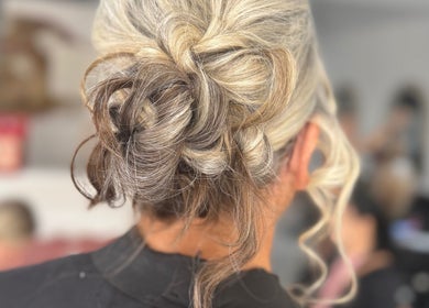 Elegant updo hairstyle crafted at Denise’s Styles, St Helens, England, GB, showcasing expert styling.