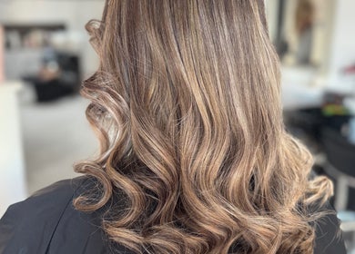 Wavy hair styled beautifully at Denise’s Styles, St Helens, England, GB salon.