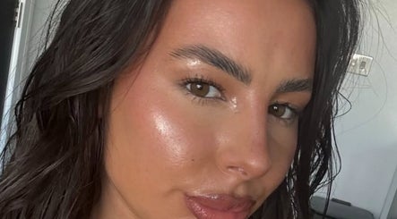 A woman with glowing skin, showcasing beauty treatment at London Aesthetic Clinic - Canary Wharf, London, England, GB.