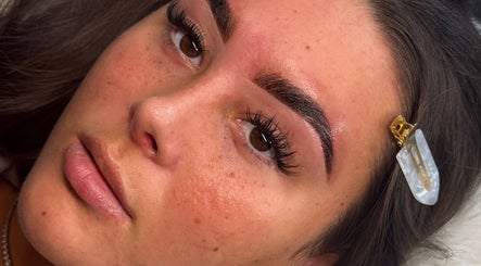 Close-up of a woman's face with perfect brows and lashes at BY.DW, Clydebank, Scotland, GB.