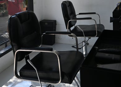 Sleek black barber chairs at Gili Mates Barbershop in Nusa Tenggara Barat, Nusa Tenggara Barat, ID.