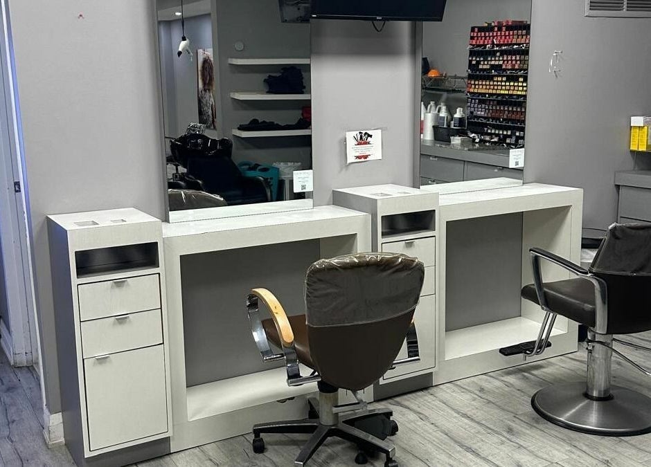 Modern styling stations at Hairxtacy Salon, Burlington, Ontario, CA, showcasing sleek design and vibrant atmosphere.