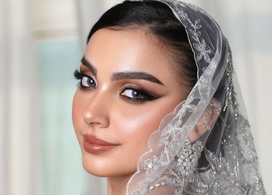 Elegant bridal look with intricate makeup at Masdool Salon, Dammam, Eastern Province, SA.