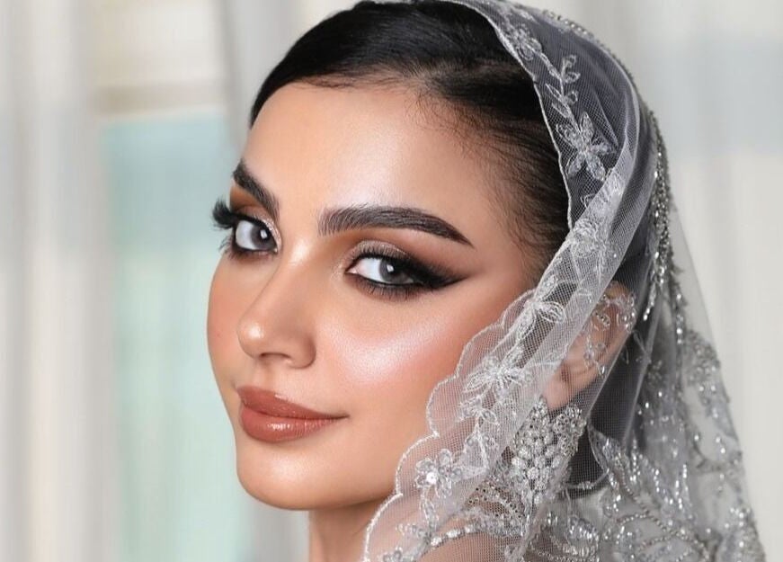 Elegant bridal look with intricate makeup at Masdool Salon, Dammam, Eastern Province, SA.