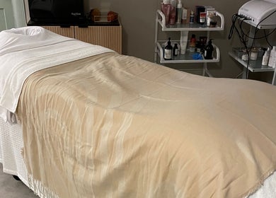 Relaxing treatment bed at The Skin Corner by Amy in Shaftesbury, England, GB, ready for a soothing wellness session.